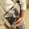 Vintage snake print clutch Black