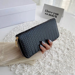 Zipped woven clutch Black