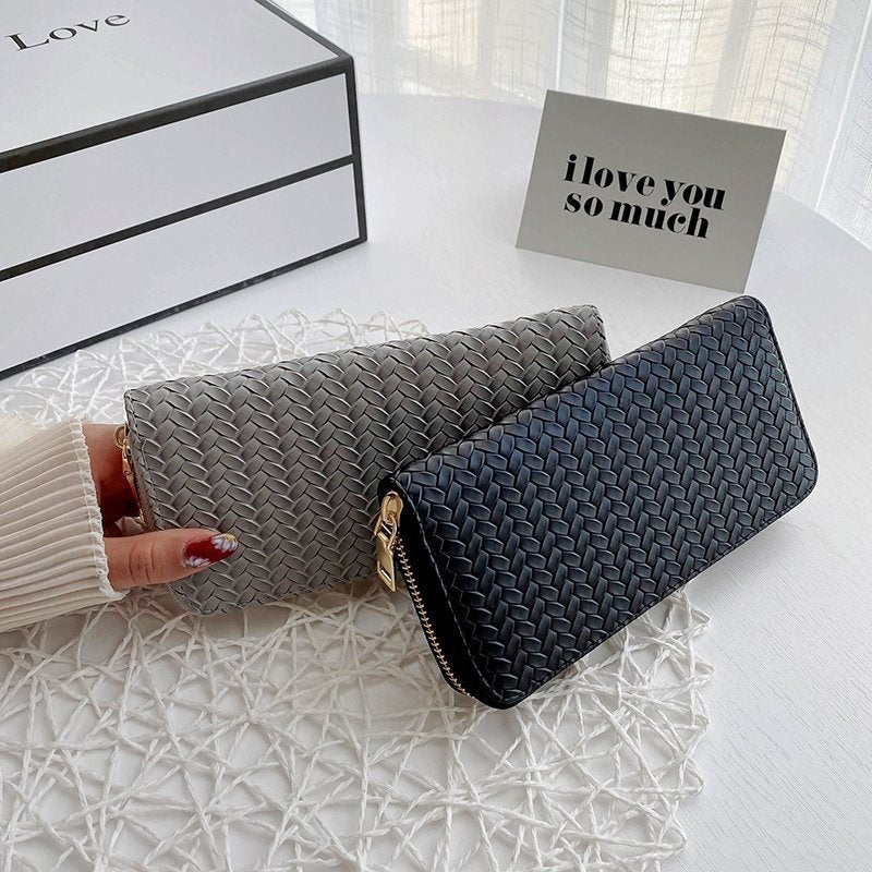 Zipped woven clutch Black