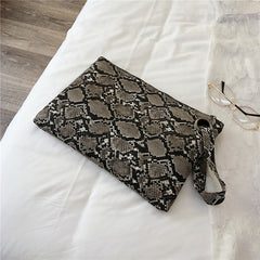 Snake print clutch