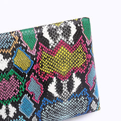 Snake print clutch handbag