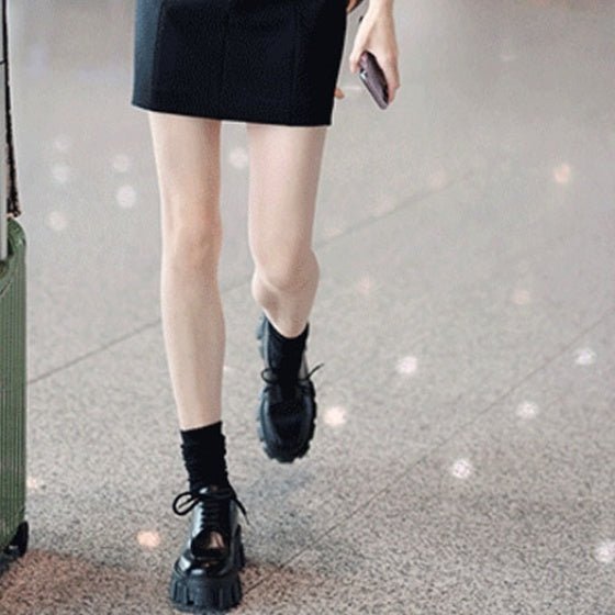 A Woman With A Platform And A Single Shoe Patent leather single inside