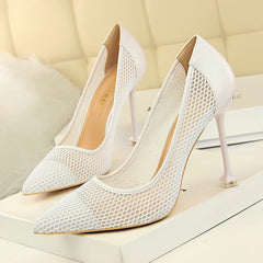 High - heeled shoes with shallow pointed toes White