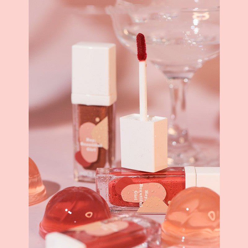 Moisturizing Ice - Through Lip Glaze: Mirror Jelly, Enduring Color Orange bubbles