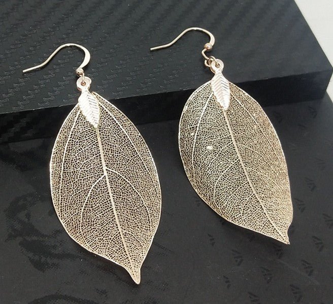 Retro Fashion Elegance Long Hollow Leaves Eardrops - Stylish Earrings White K