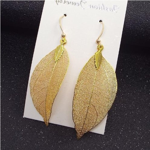 Retro Fashion Elegance Long Hollow Leaves Eardrops - Stylish Earrings White K