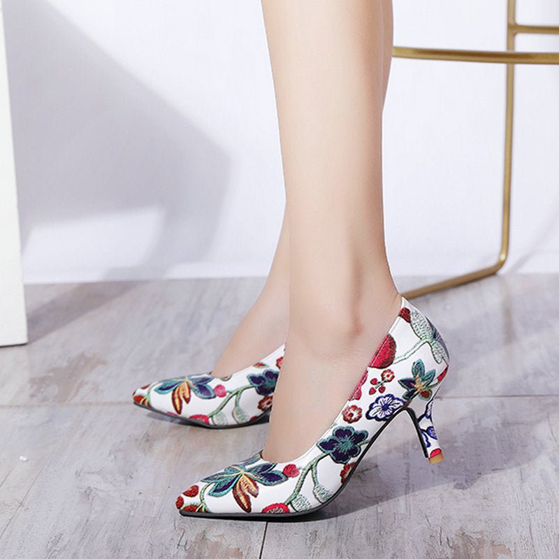 Shallow mouth pointed high heels Black
