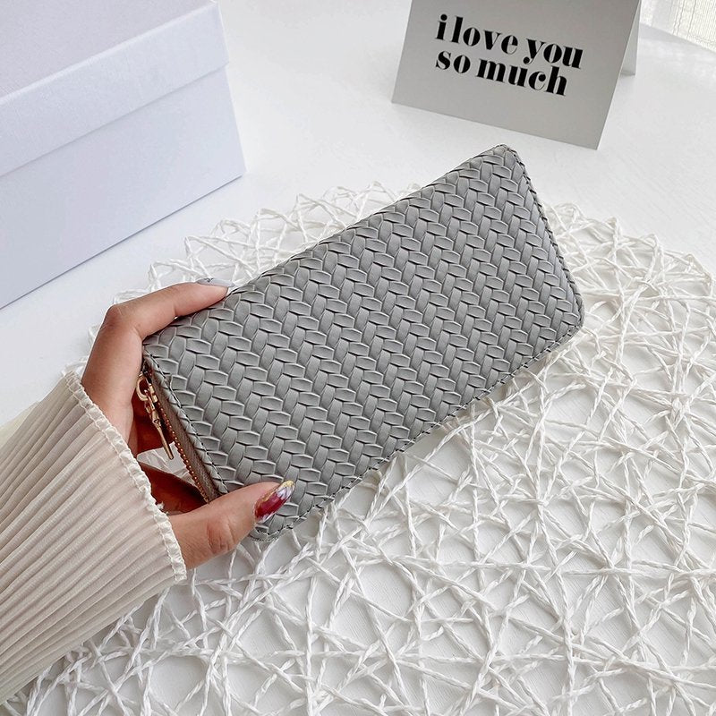 Zipped woven clutch Black